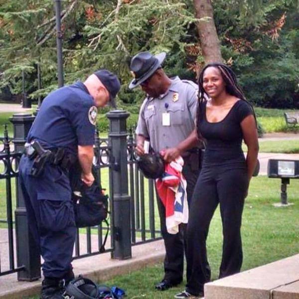 Photo of the woman who scaled the SC flagpole and pulled down the Confederate flag.